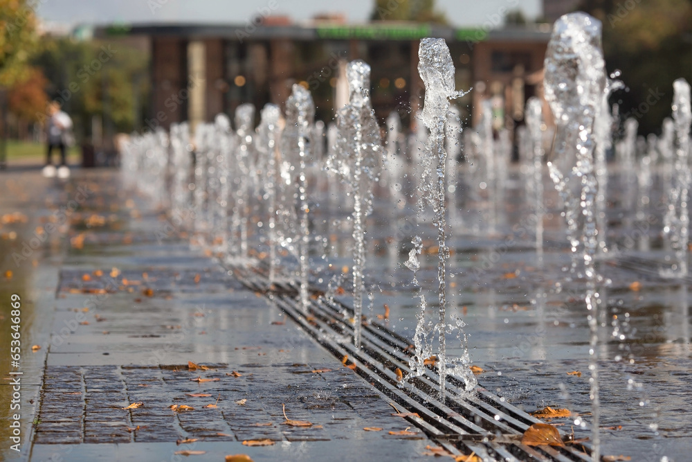 Abnormally hot autumn weather in the city. Water jets of the fountain in the Muzeon Park in Moscow. Russia, Moscow, September 2023 Abnormally hot autumn weather in the city. Water jets of the fountain in the Muzeon Park in Moscow. Russia, Moscow, September 2023
