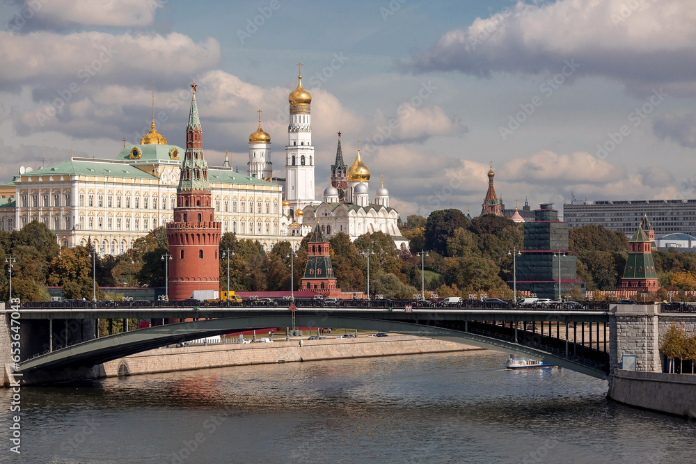MOSCOW, RUSSIA - SEPTEMBER 26, 2023: View of Moscow on an autumn day. The capital of Russia. The Grand Kremlin Palace. Kremlin embankment. The Moscow River. A popular tourist attraction. MOSCOW, RUSSIA - SEPTEMBER 26, 2023: View of Moscow on an autumn day. The capital of Russia. The Grand Kremlin Palace. Kremlin embankment. The Moscow River. A popular tourist attraction.