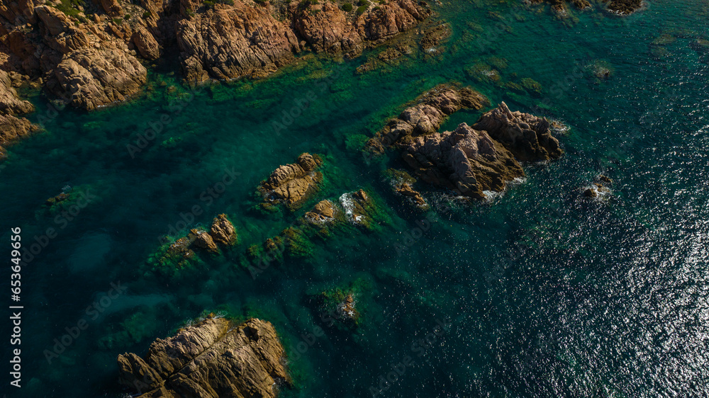 Obraz premium The coastline of the north-west of Sardinia. Di Cala Beach near Canneddi. Photos taken with a drone. Sardinia, Italy.