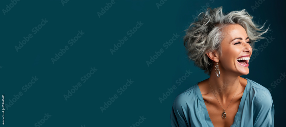 Portrait of a beautiful smiling elderly woman with gray hair - obrazy, fototapety, plakaty 