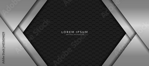 The dark background consists of reflective metallic lines. hexagonal metal texture background