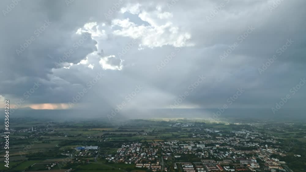 Aerial imagery reveals Italy's rustic charm amidst the tumultuous embrace of stormy clouds.
Aerial imagery reveals Italy's rustic charm amidst the tumultuous embrace of stormy clouds.