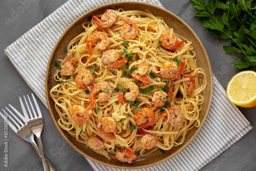 Canvas Print Baked Shrimp Scampi Linguine Pasta with Parsley on a Plate, top view