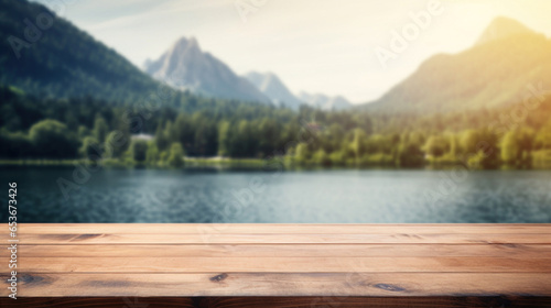 Blank wood tabletop with blurred background of river and mountain © red_orange_stock