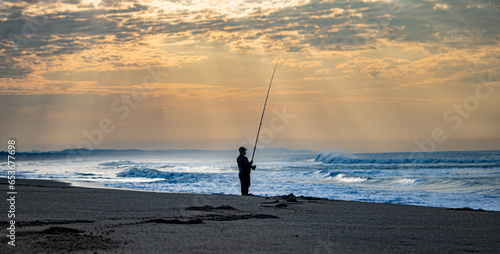 Lone Fisherman on the Beach
