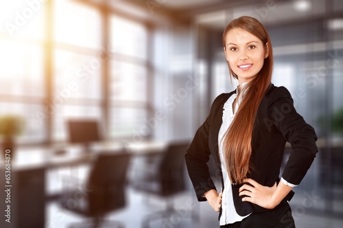 Free Download Attractive young business woman smiling and posing, AI generated image - GFXLoad