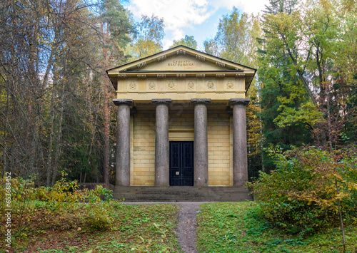 Mausoleum with inscription "To spouse - benefactor" in Pavlovsky park in autumn, Saint Petersburg, Russia © Mistervlad