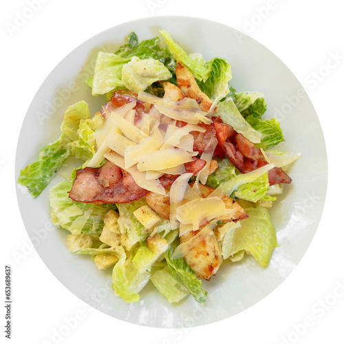 Spicy salad with grilled chicken steak and bacon. Lunch or dinner of chicken breast cutlets, vegetable garnish with Italian cheese, object on a white background.