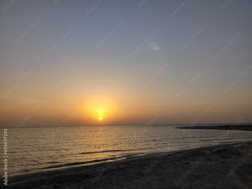sunset on the beach qatar