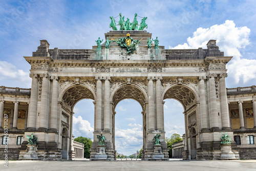 The Cinquantenaire Memorial Arcade in the centre of the Parc du Cinquantenaire, Brussels, Belgium with the text 