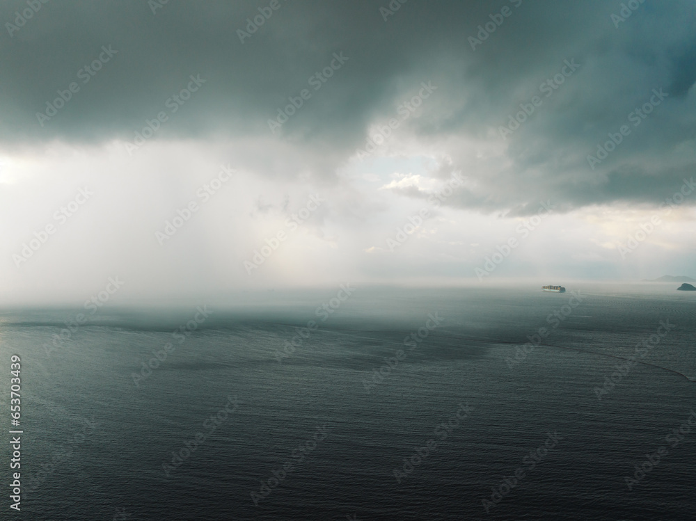 Aerial view of storm clouds with ocean landscape in the morning Aerial view of storm clouds with ocean landscape in the morning