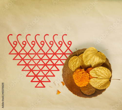 Dussehra background with 'Saraswati Yantra' drawn along with Sona leaves and flowers. Hindu festival Dashahara background template with Goddess Saraswati symbol.
