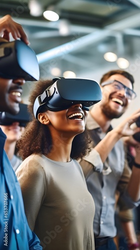 Professional advertisement photograph of a group of smiling university students discussion around one student with VR headset in a big room, bright daylight