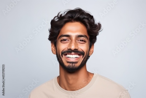 Closeup Photo Portrait Of Indian Man With Bright Smile And Clean Teeth, Suitable For Dental Advertisements He Has Stylish Hair And Welldefined Jawline, Isolated On White ()