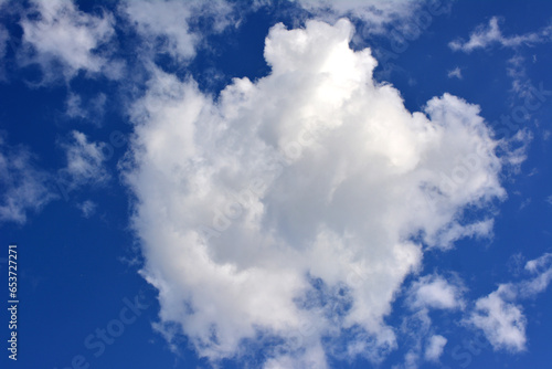 white cloud isolated on dark blue sky close up