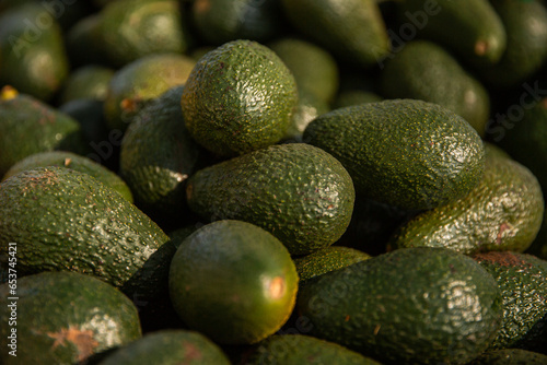 avocados at a farmers market photo
