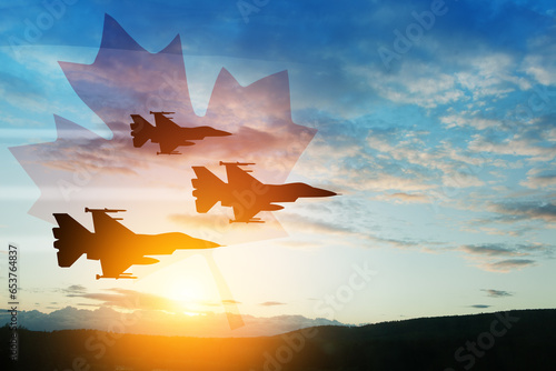 Air Force Day. Aircraft silhouettes on background of sunset with a transparent Canadian flag. Since 2006, the Royal Canadian Air Force has celebrated Air Force Day on 4 June. photo