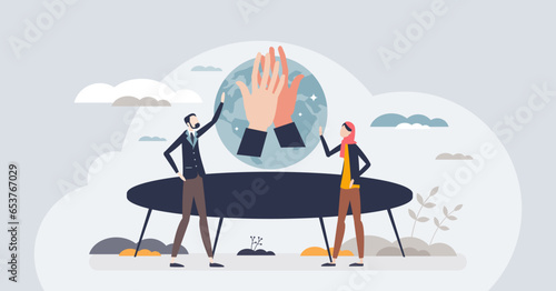 Global business etiquette for international business tiny person concept. Deal and agreement finishing with handshake and friendly communication vector illustration. Diverse culture and ethnicity.