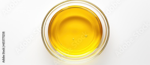 Isolated view of cooking oil in glass bowl photo