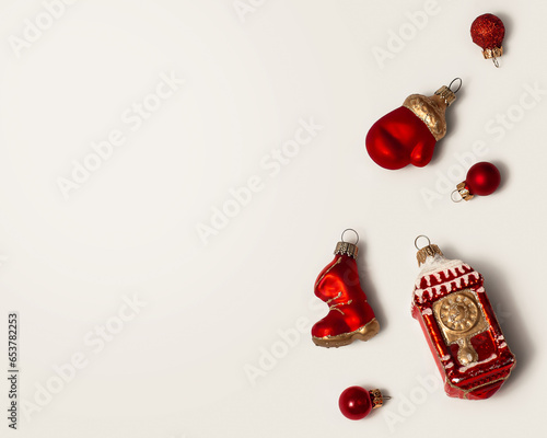 Wallpaper Mural Red New Year's Christmas toys on a white background. Glass boot, mitten and watch for decorating the Christmas tree. Toys isolated. Torontodigital.ca