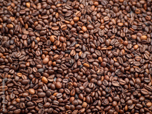 Close-up of roasted coffee beans. Background from Coffee beans.