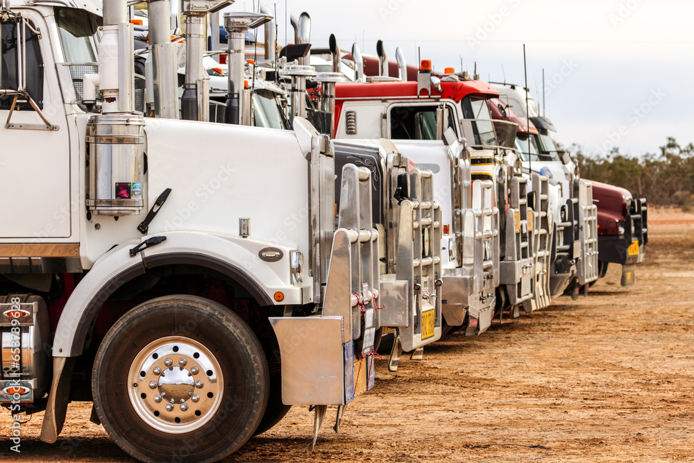 Semi trailer trucks lined up. Semi trailer trucks lined up.
