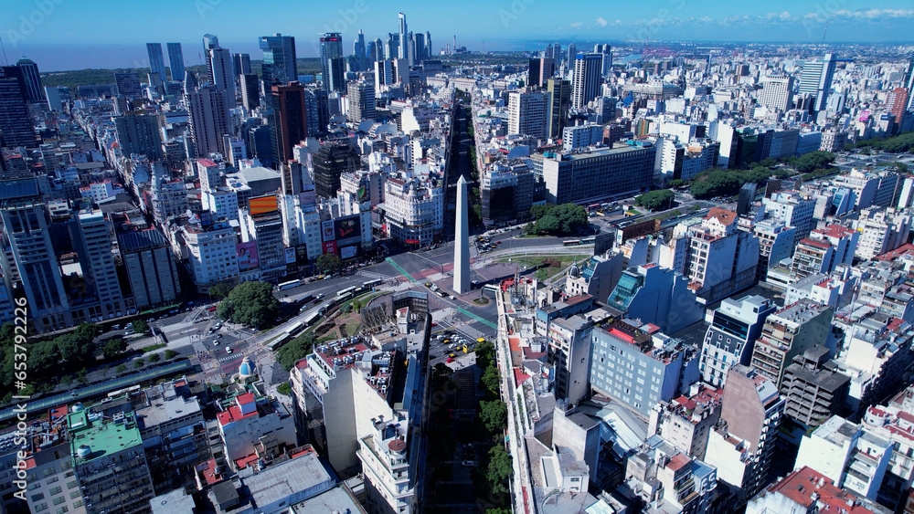 Fototapeta premium Obelisk Square Cityscape of Buenos Aires Argentina. Panorama landscape of touristic landmark downtown capital Argentina. Touristic landmark. Outdoor downtown city. Urban scenery of Buenos Aires city.