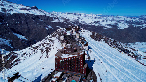 Santiago Chile. Ski station center at snowing Andes Mountains near Santiago Chile. Snow mountain landscape at winterness. Winter ness travel destination. Winter ness tourism travel. photo