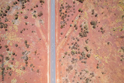 Aerial view of desert road with surrounding shrubbery