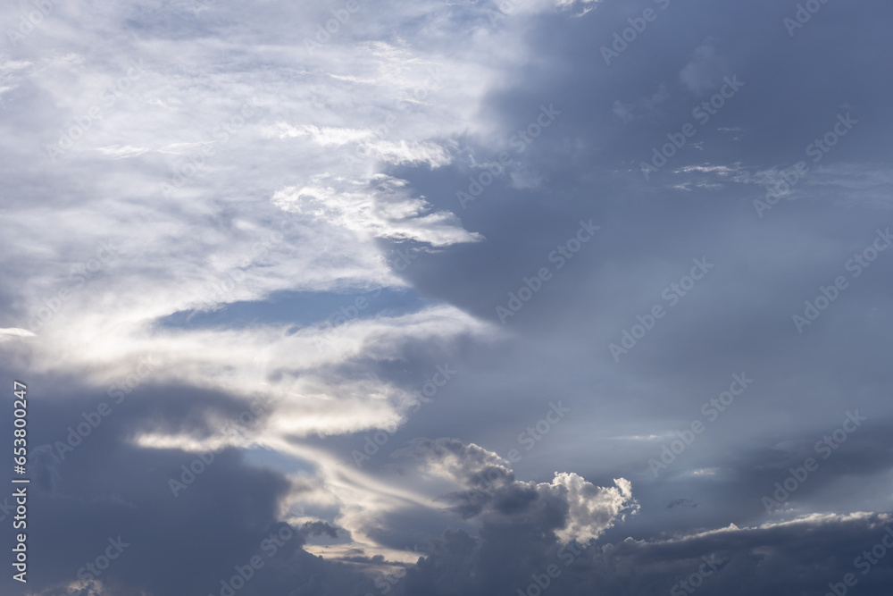 Landscape of skies with clouds and sun rays illuminating some areas. Vector sky texture background Landscape of skies with clouds and sun rays illuminating some areas. Vector sky texture background