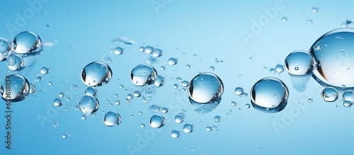 Pastel blue backdrop with droplets
