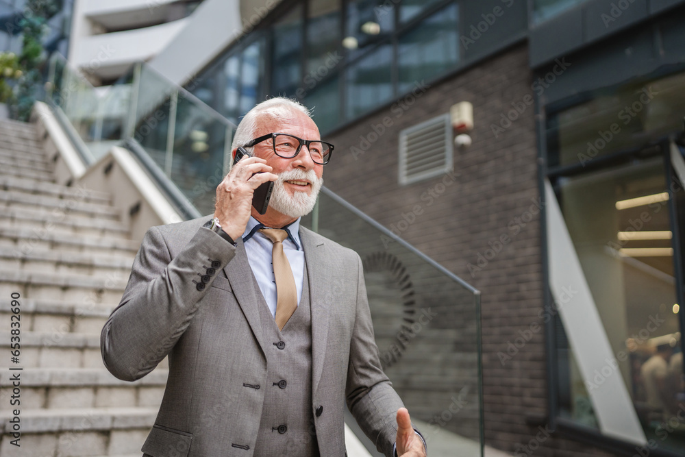 Portrait of senior man with beard businessman in suit stand outdoor Portrait of senior man with beard businessman in suit stand outdoor