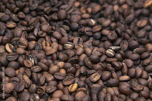 Light roast coffee. Closeup of coffee beans for background and texture. Coffee beans background.