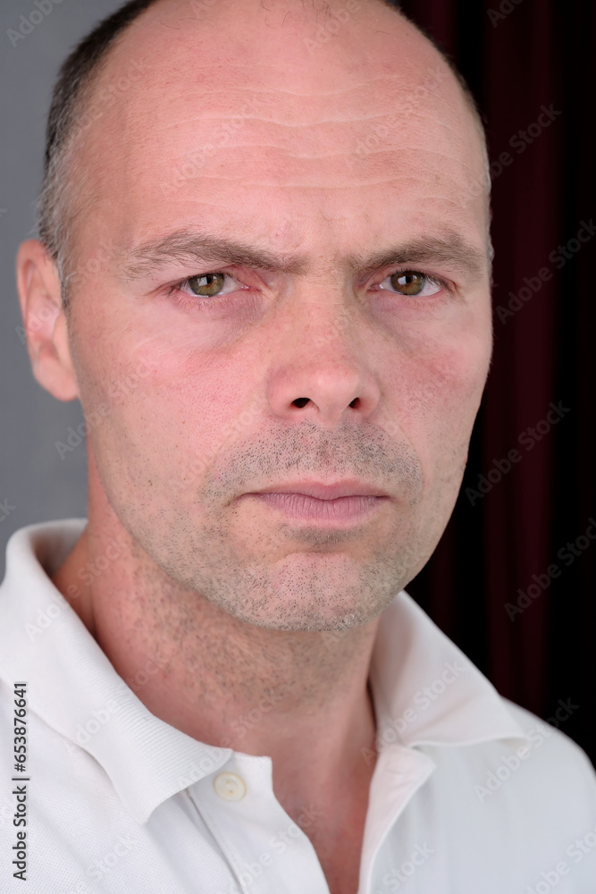 Obraz premium Portrait of a young man with a short haircut