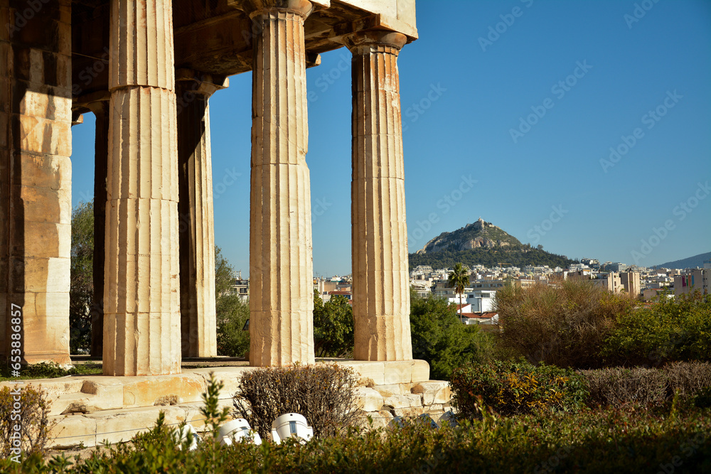 
columns of the Greek museum with a view of Lycabetus