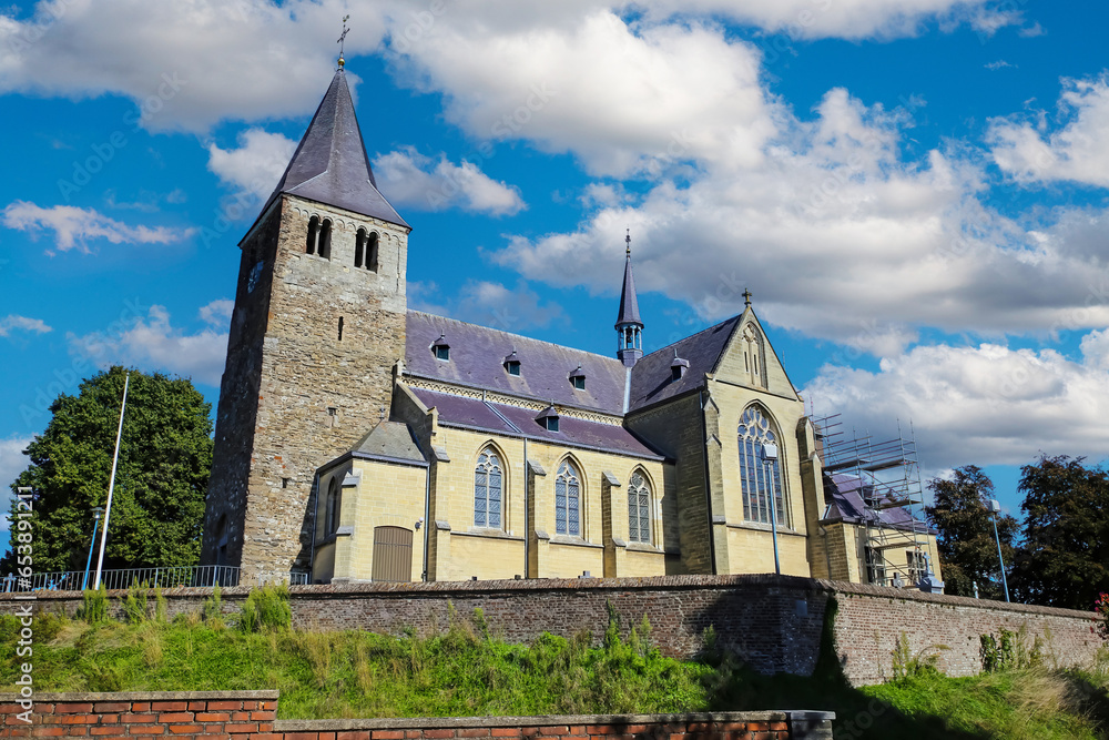 Heel, Netherlands - September 9. 2023: roman catholic church in town of limburg in summer