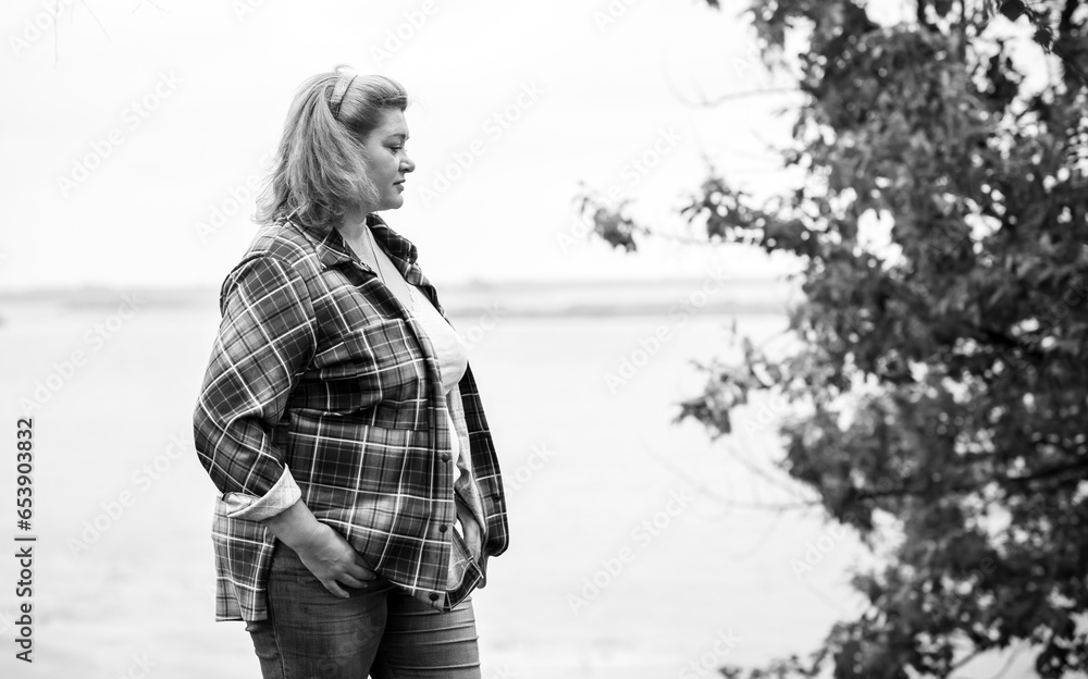 Sad Simple plump middle aged woman thinking about something, crisis of ...