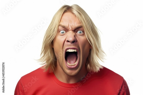 A man wearing a red shirt with his mouth open in surprise or shock. This image can be used to depict astonishment, excitement, or unexpected reactions.