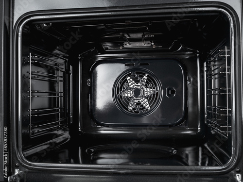 Modern electric oven with ventilation and blowing system with grill system pyrolytic coating close-up photo