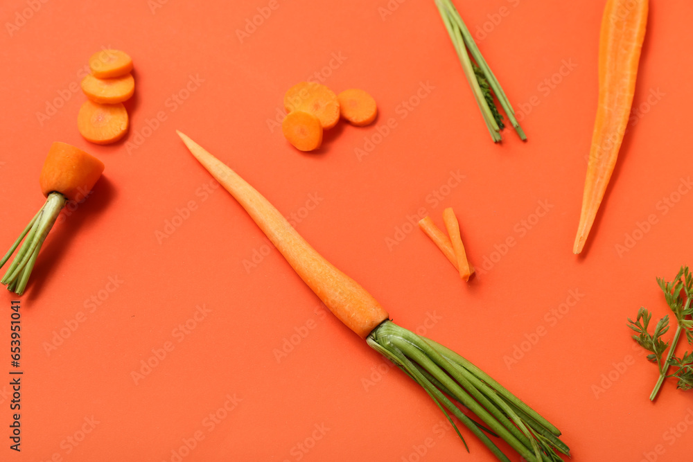 Fresh carrot and slices on orange background Fresh carrot and slices on orange background