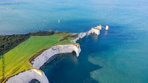 Amazing panorama aerial view of the famous Old Harry Rocks, the most eastern point of the Jurassic Coast, a UNESCO World Heritage Site photo