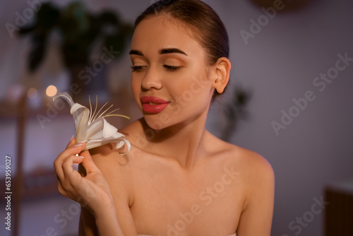 Pretty young woman with lil...