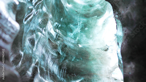 Fényképezés Ice crevasse with glacier rocks at vatnajokull mass, inside ice caves with transparent crashed icebergs