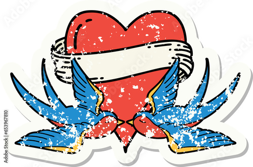 distressed sticker tattoo in traditional style of swallows and a heart with banner
