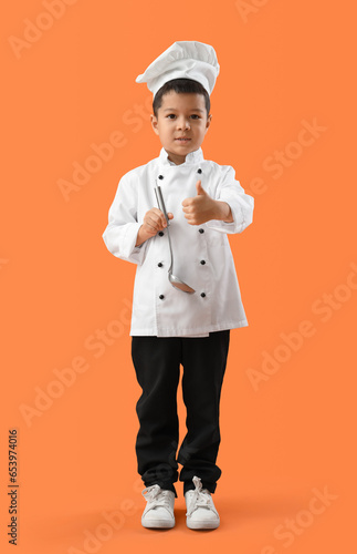 Cute little chef with ladle...