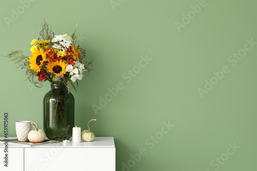 White sideboard with bouque...