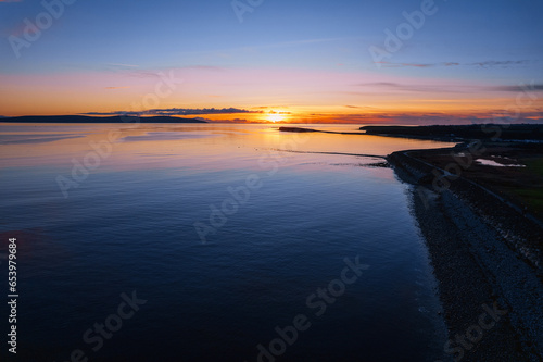 Salthill beach outline and sunset sky over Galway bay  Ireland. Aerial view. Rich saturated color.