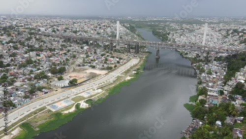 vista de santo domingo con puente de la 17 y el rio ozama, guachupita  photo