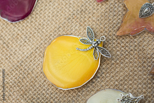 pendant with flower petal inside resin photo