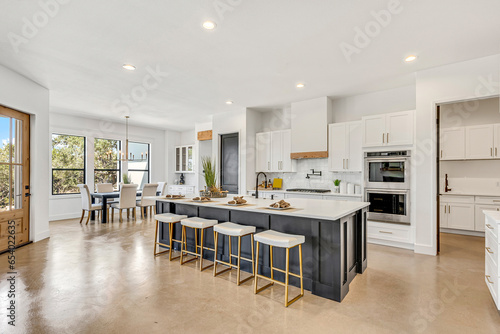 A home kitchen with white and wood accents